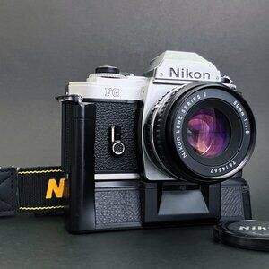 Nikon FG 35mm SLR Program Camera w/ Nikon 50mm f:1.8 & MD-E Motor Drive